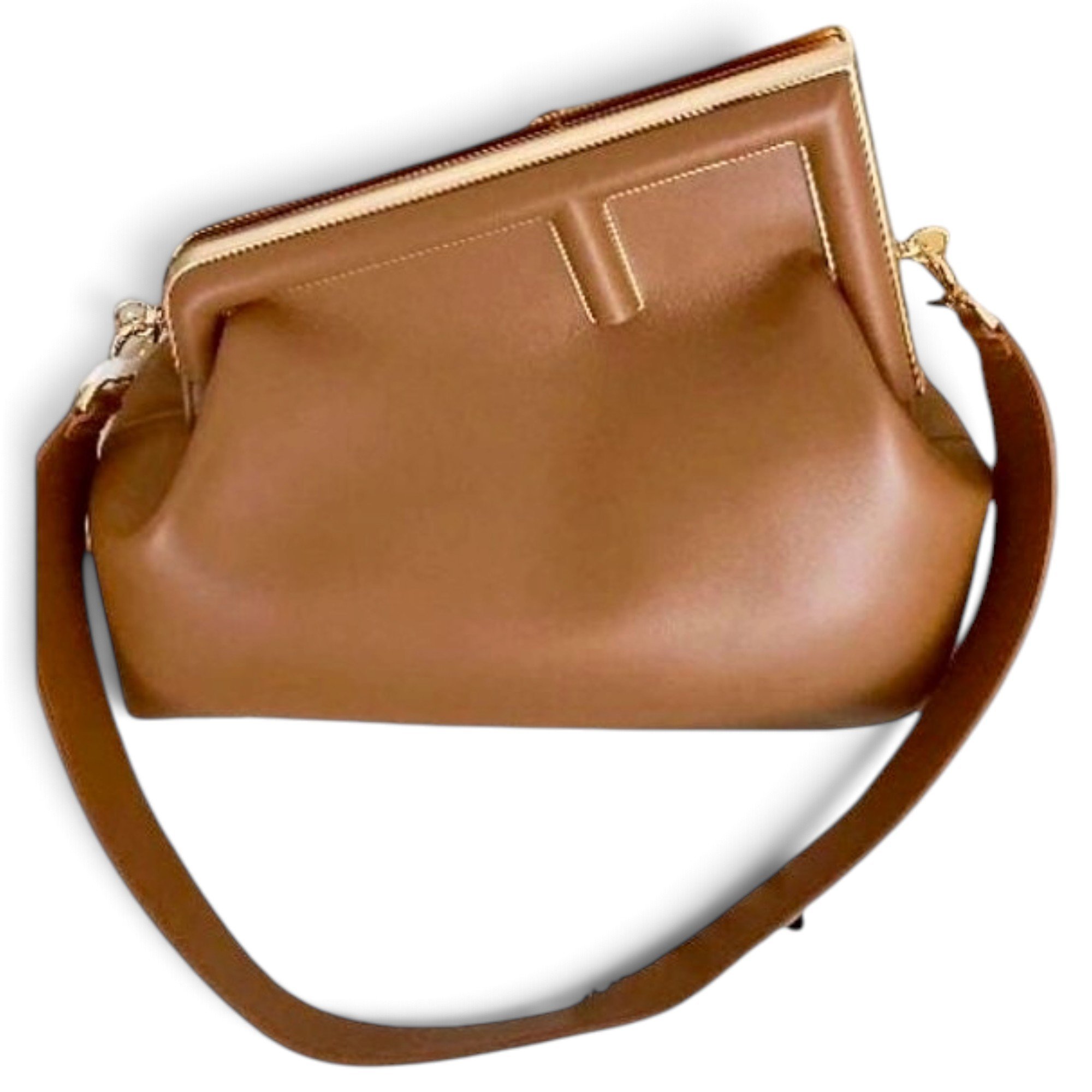First leather handbag