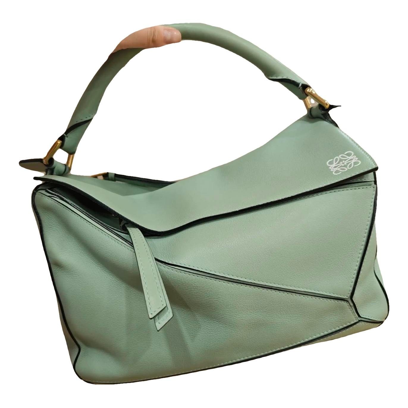 Puzzle leather handbag