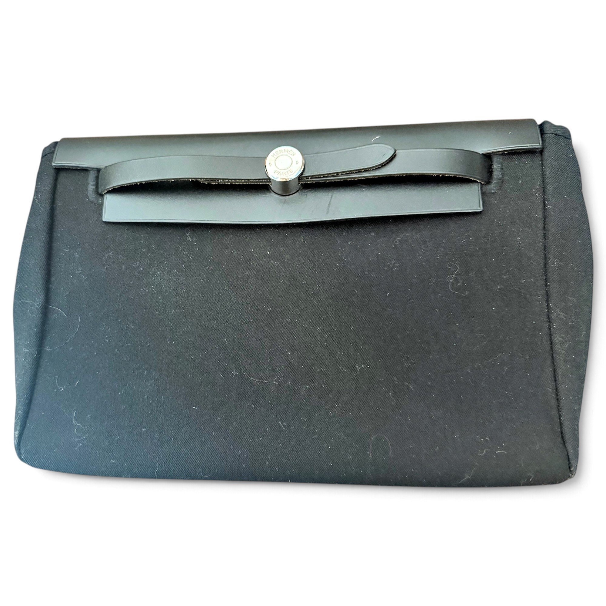 Jige leather clutch bag