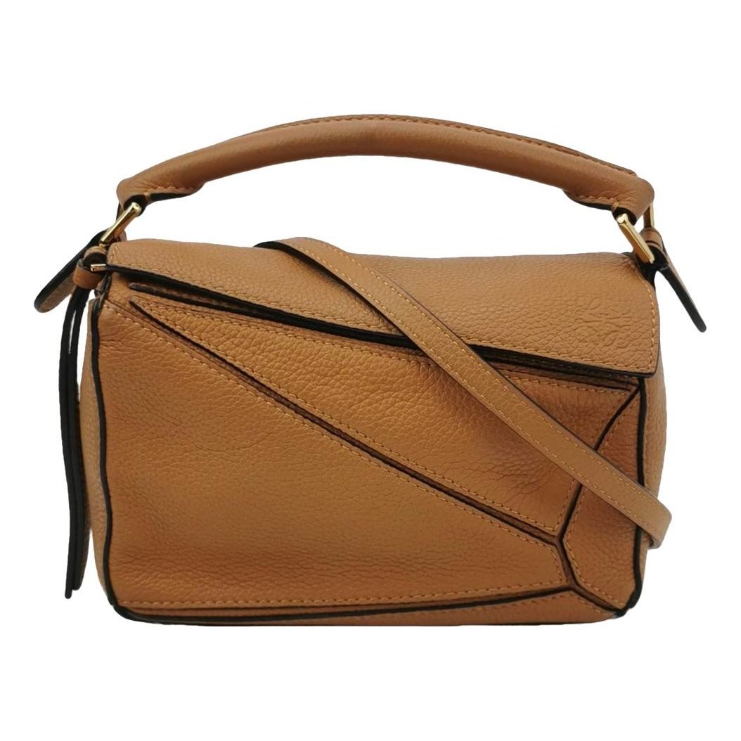 Puzzle leather handbag
