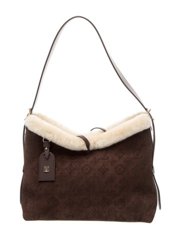 Louis Vuitton Perforated Monogram Carryall PM