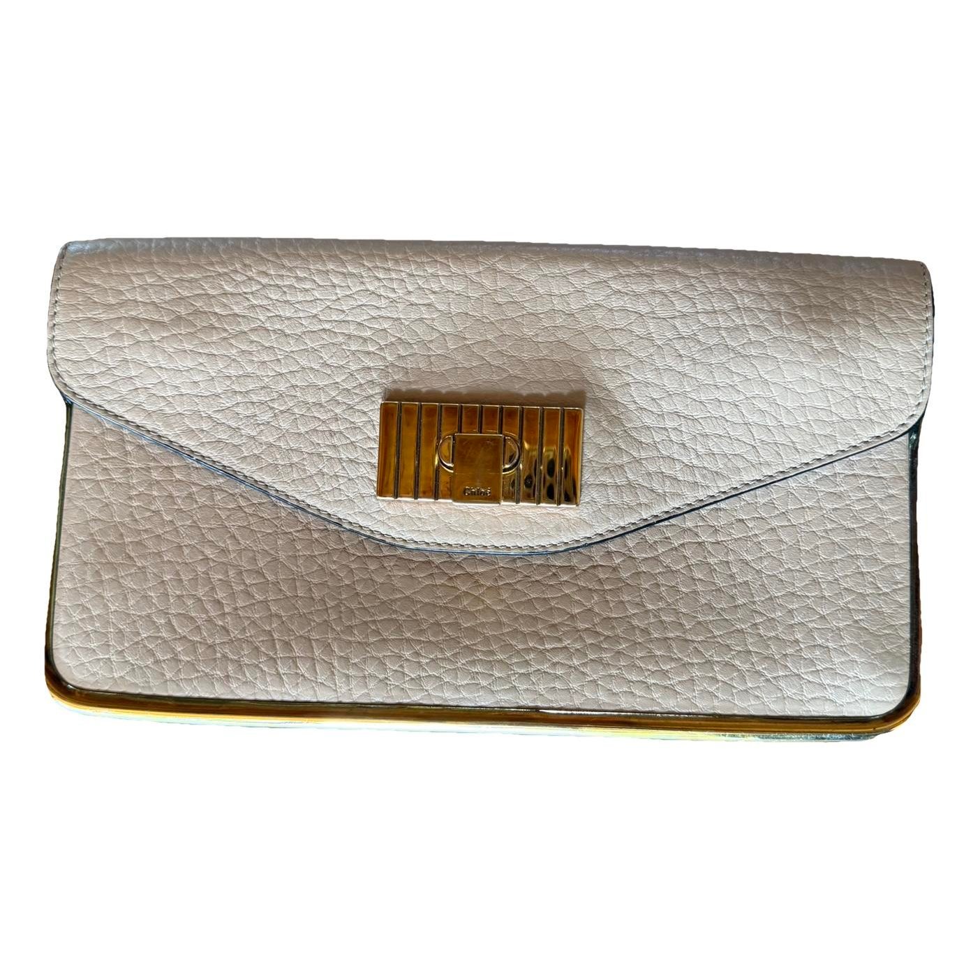 Patent leather clutch bag