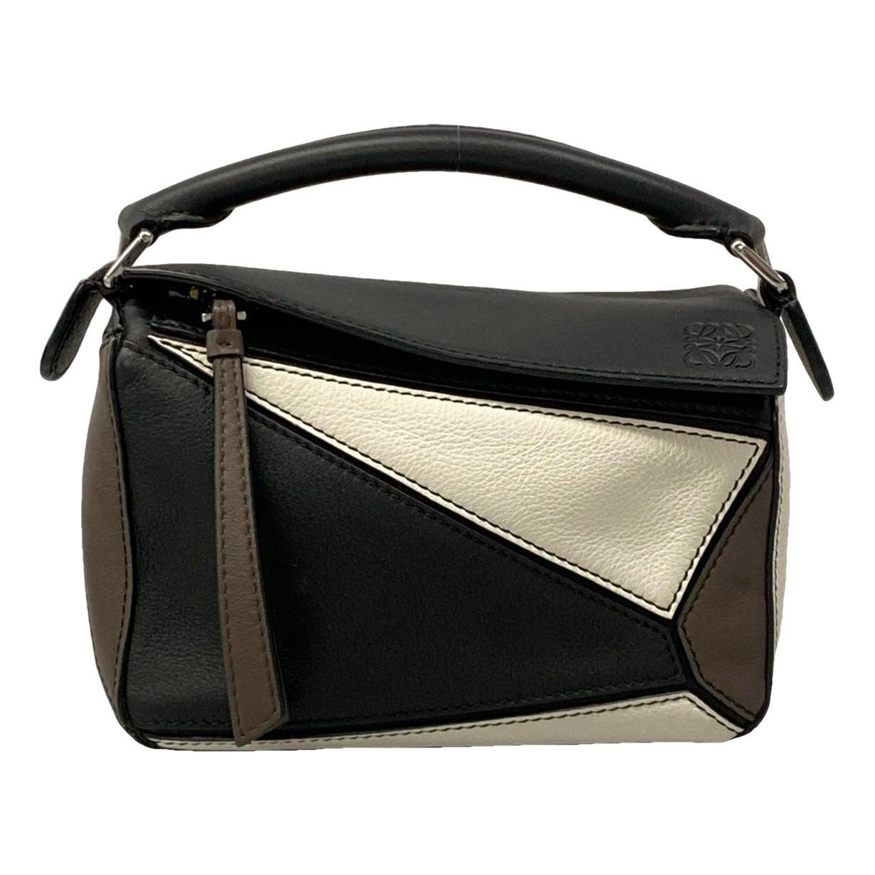 Puzzle leather handbag