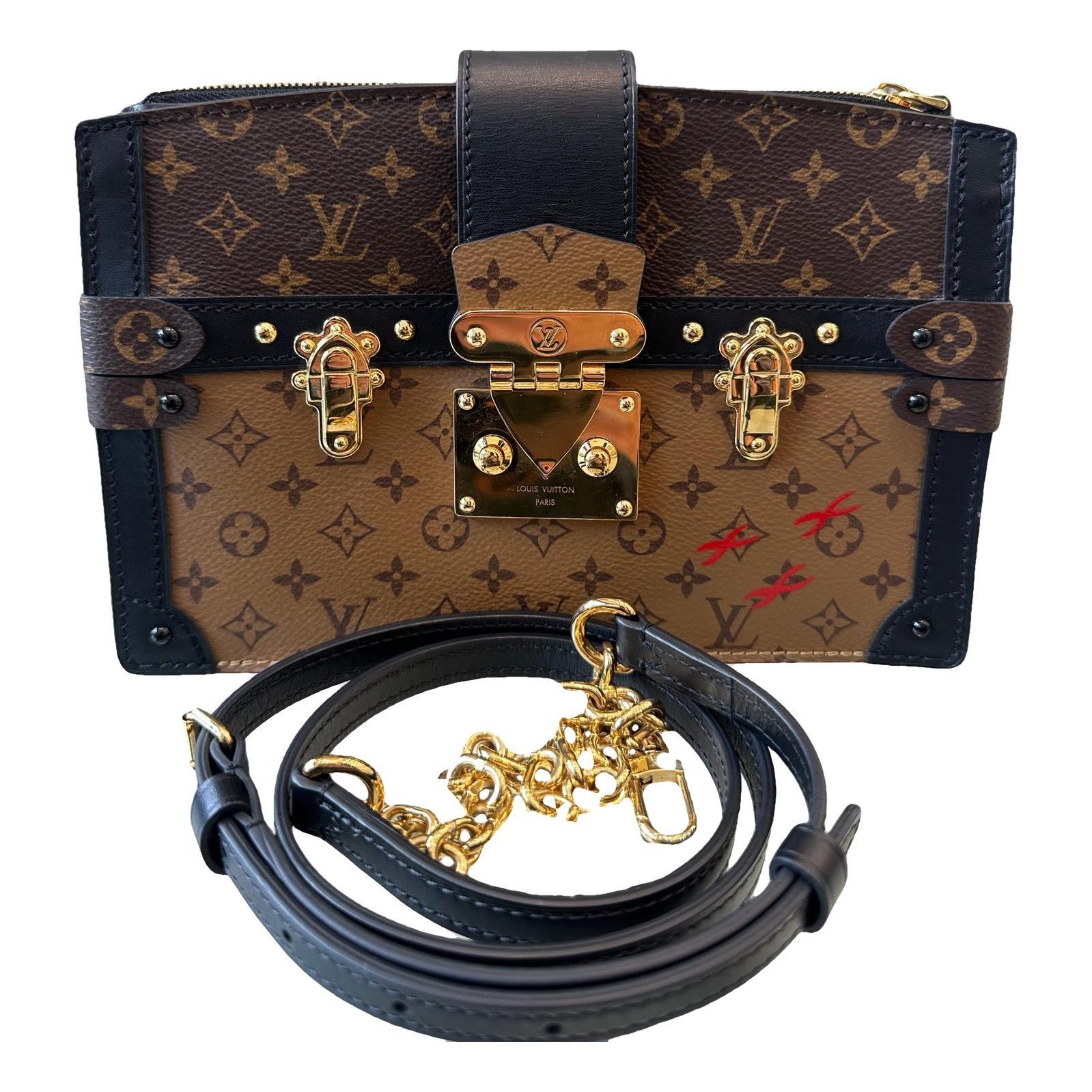 Pochette Trunk leather handbag