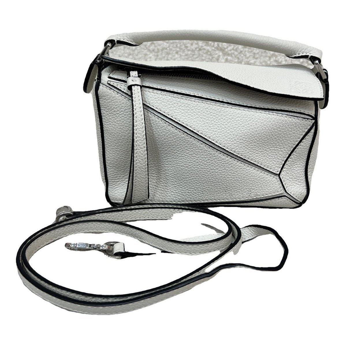 Puzzle leather handbag