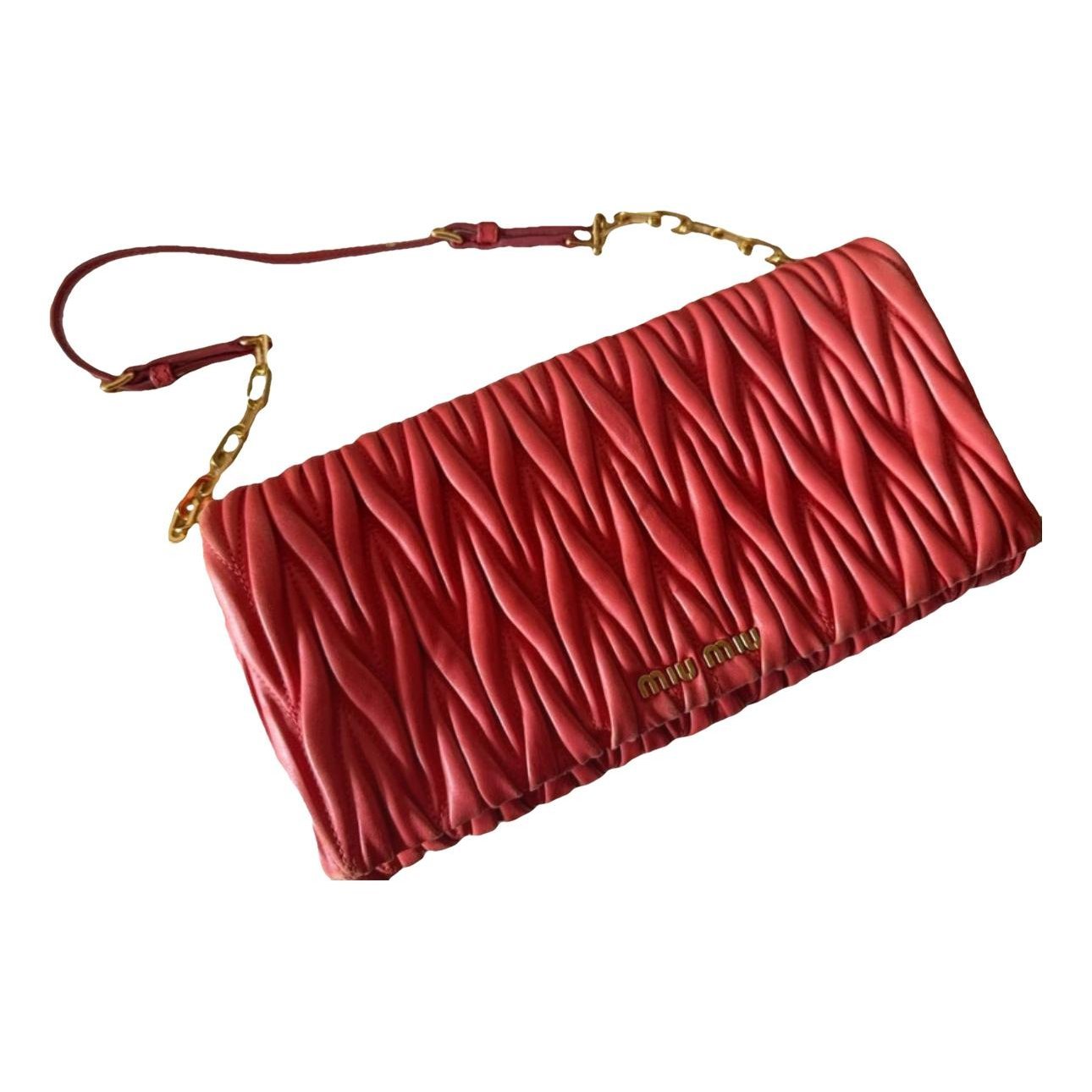 Matelassé leather clutch bag