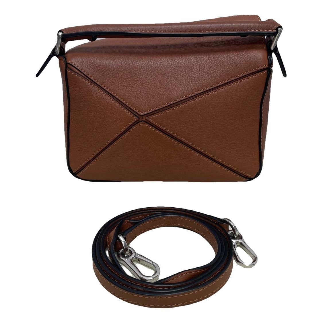 Puzzle leather handbag