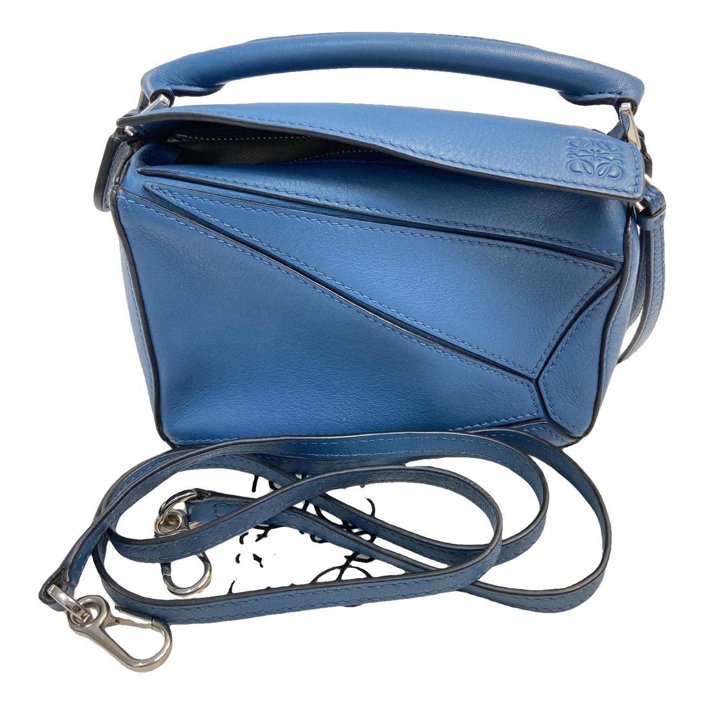 Puzzle leather handbag