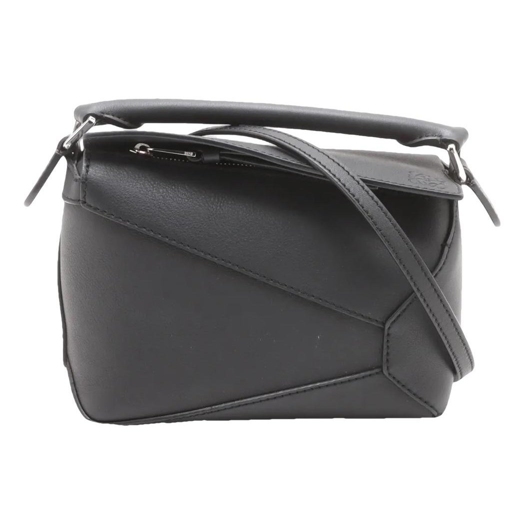 Puzzle leather handbag