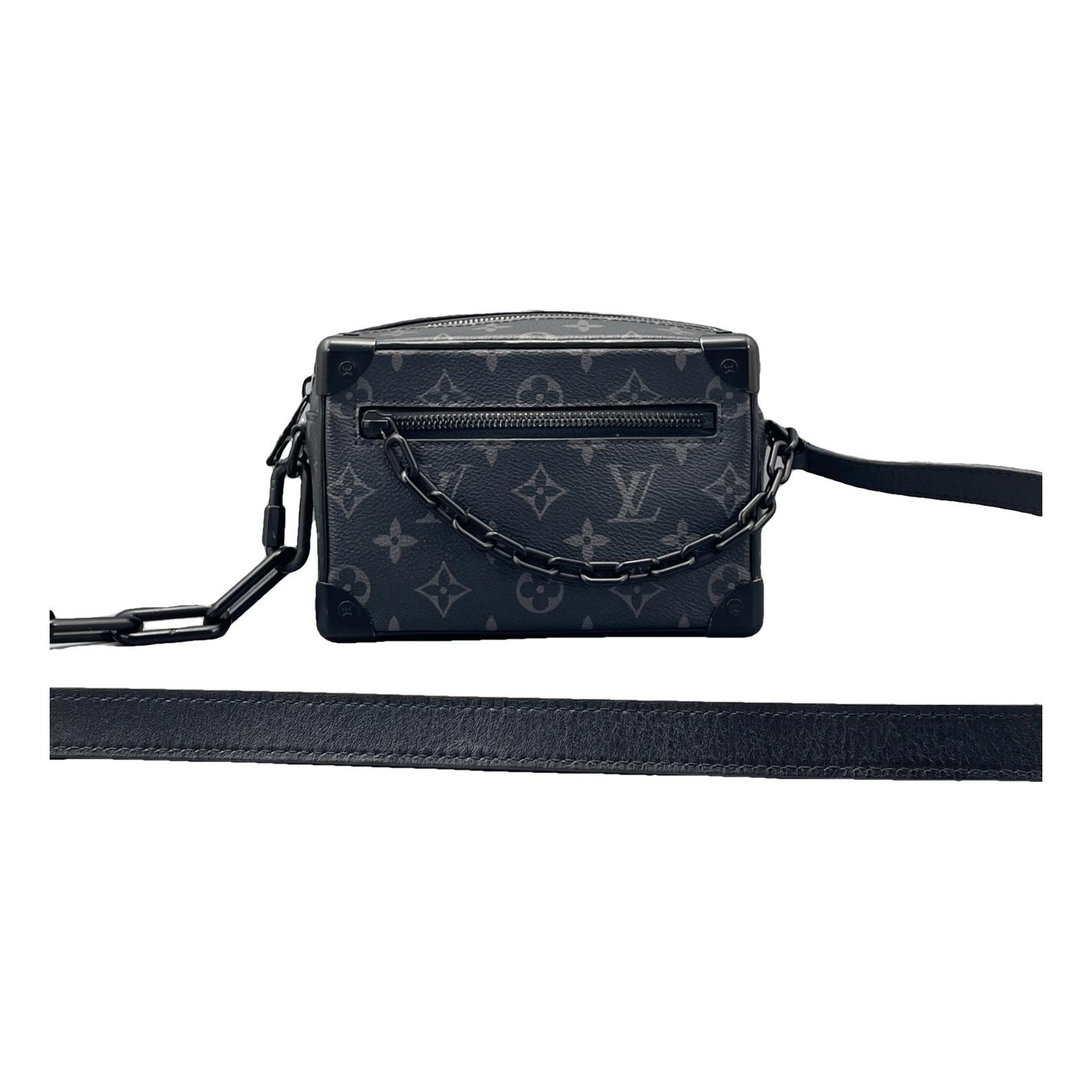 Pochette Trunk leather handbag