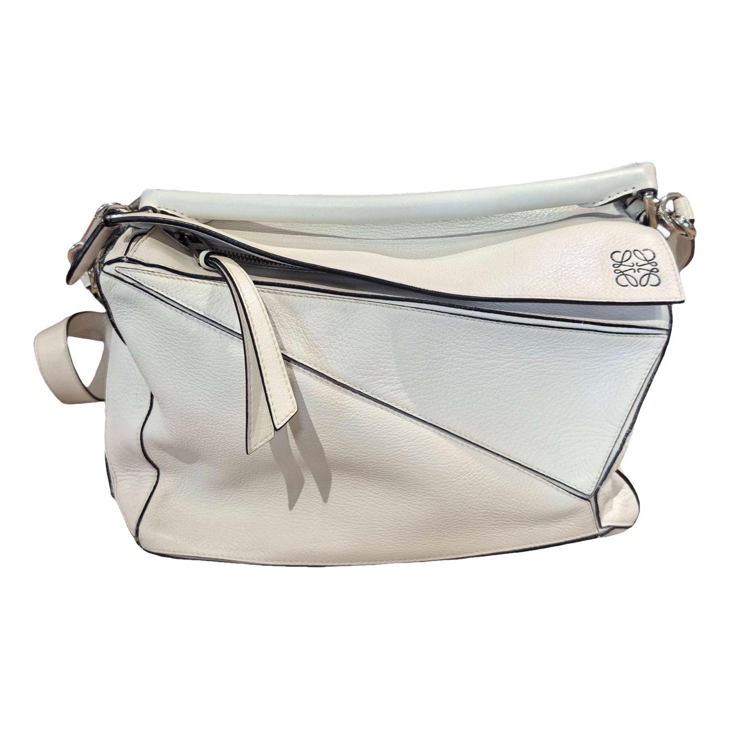 Puzzle leather handbag