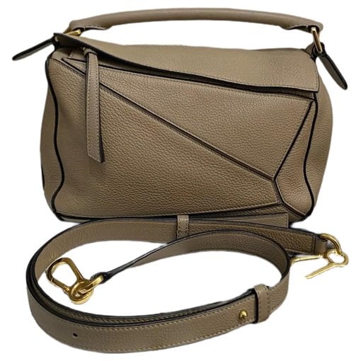 Puzzle leather handbag