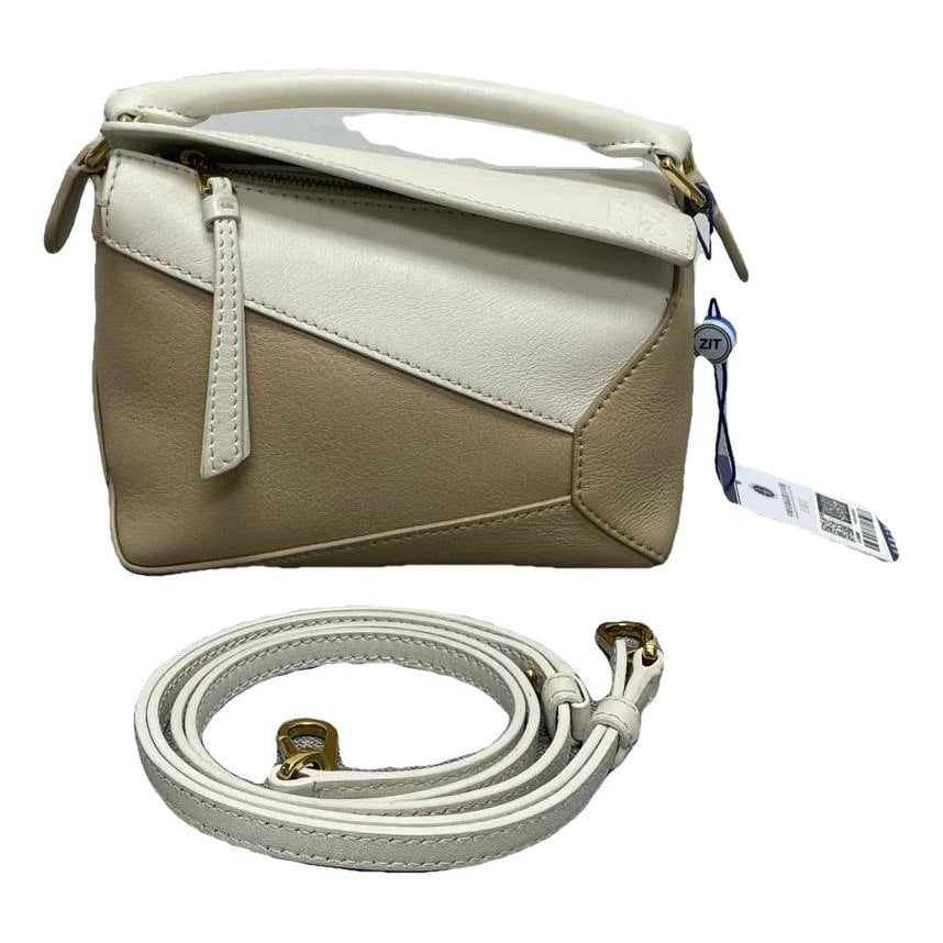 Puzzle leather mini bag