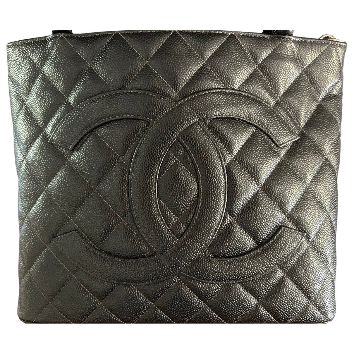 Médaillon leather handbag