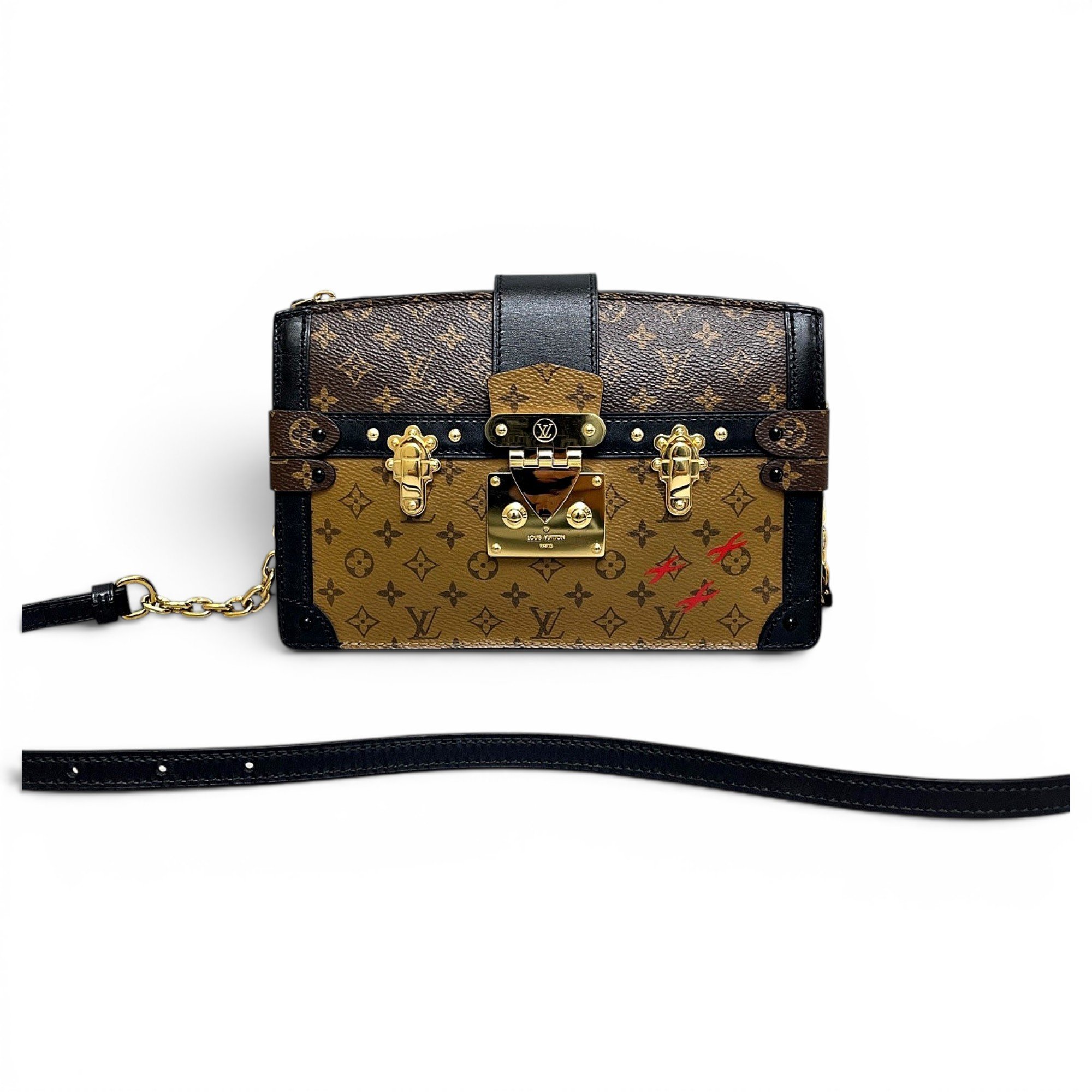 Pochette Trunk leather handbag