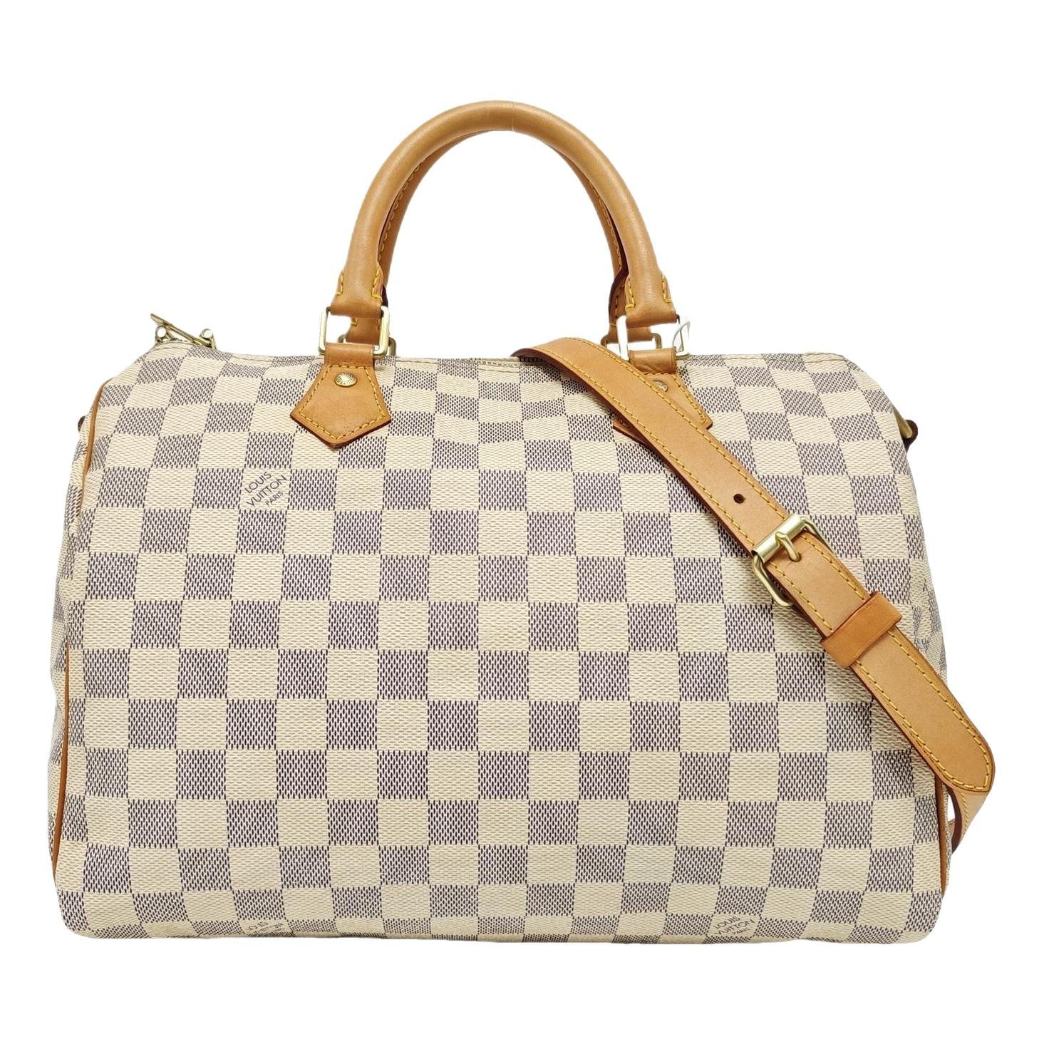 Nano Speedy / Mini HL leather handbag