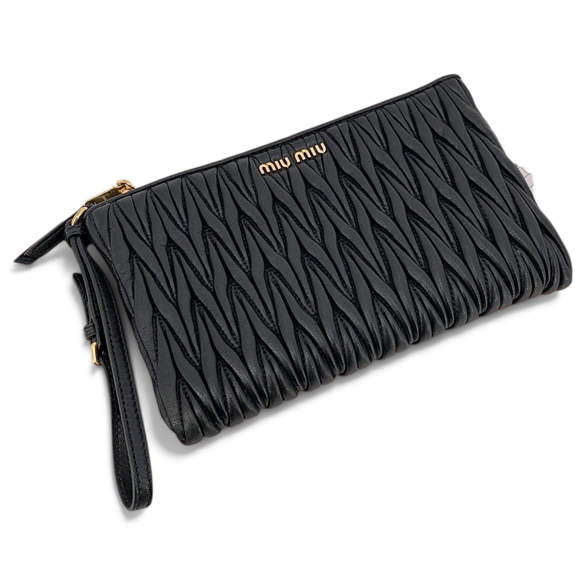 Matelassé leather clutch bag