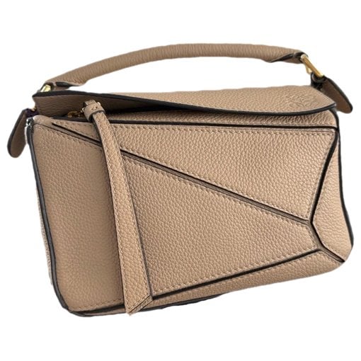 Puzzle leather handbag