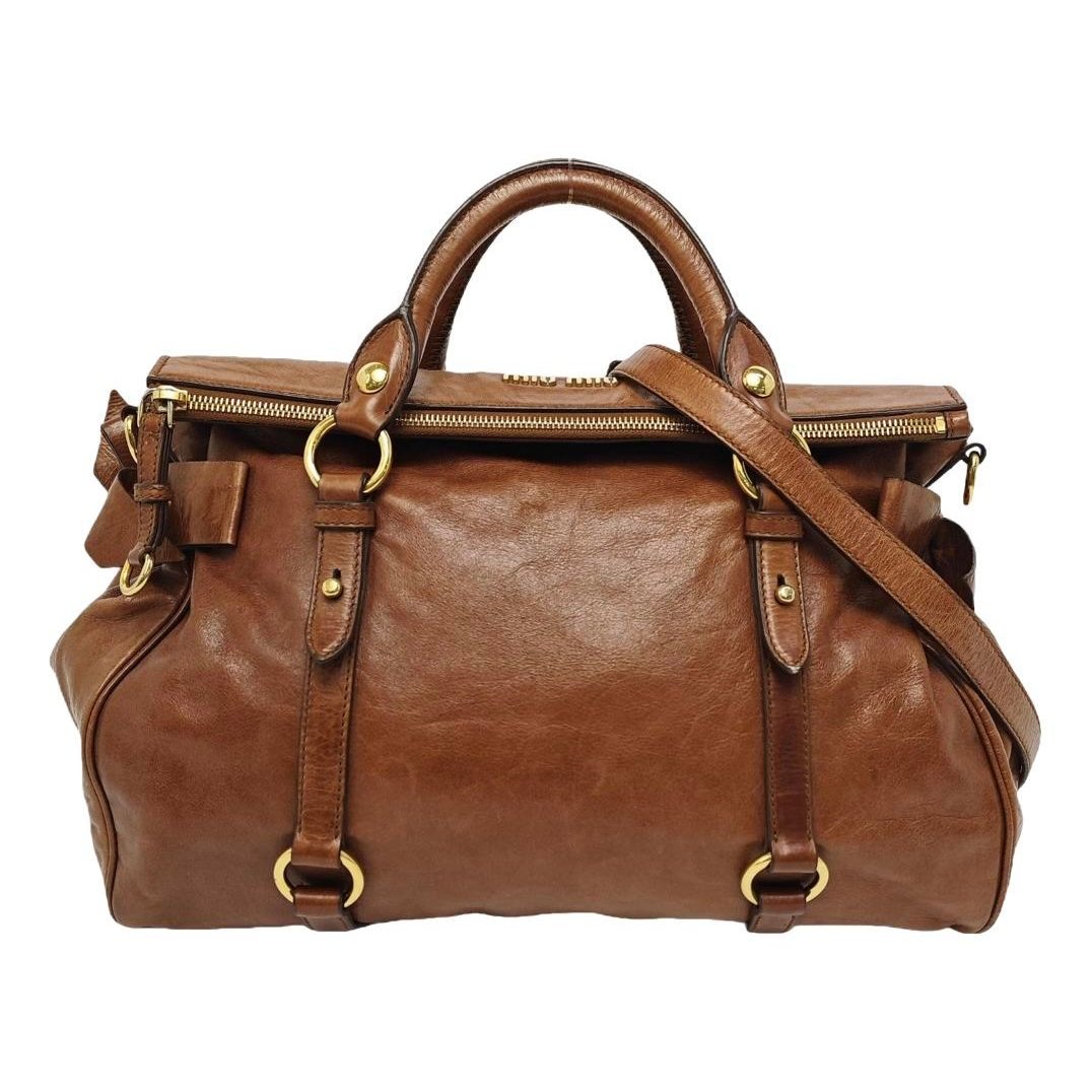 Bow bag leather handbag