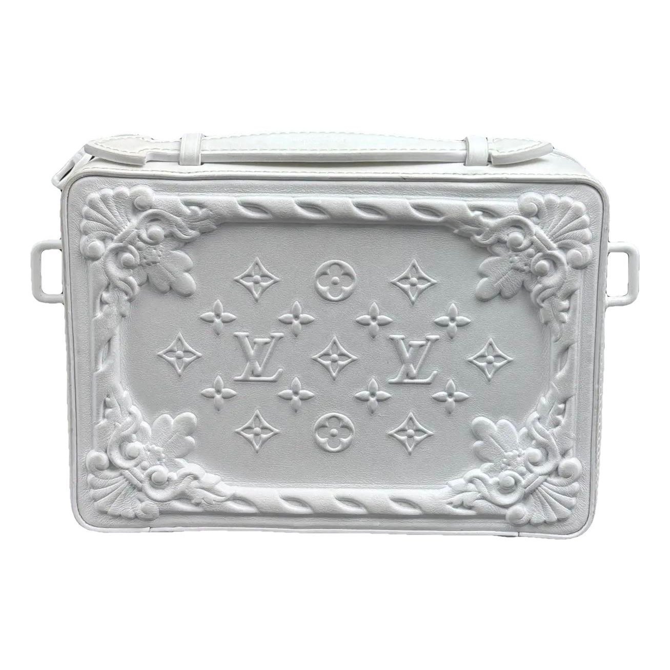Side Trunk leather crossbody bag
