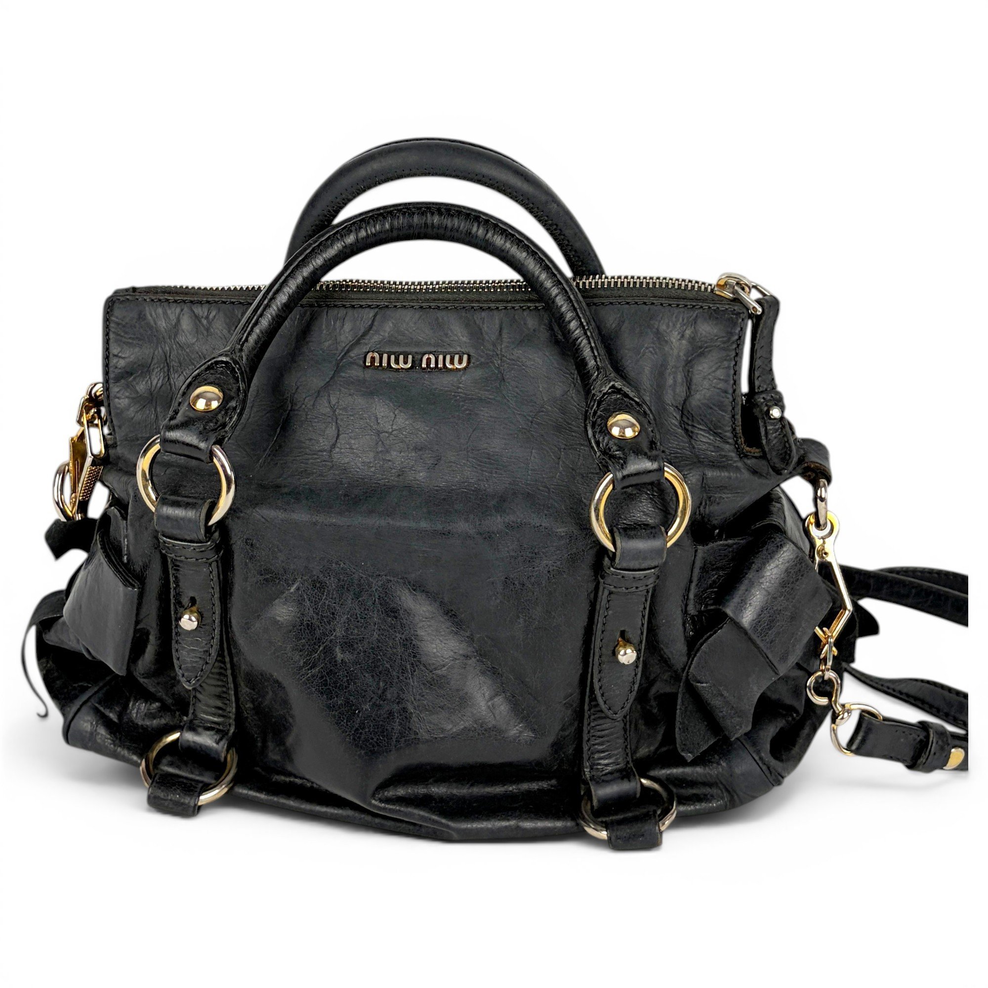 Bow bag leather handbag