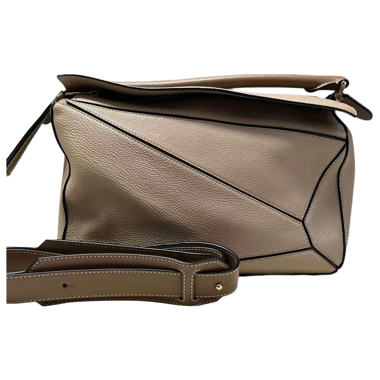 Puzzle leather handbag