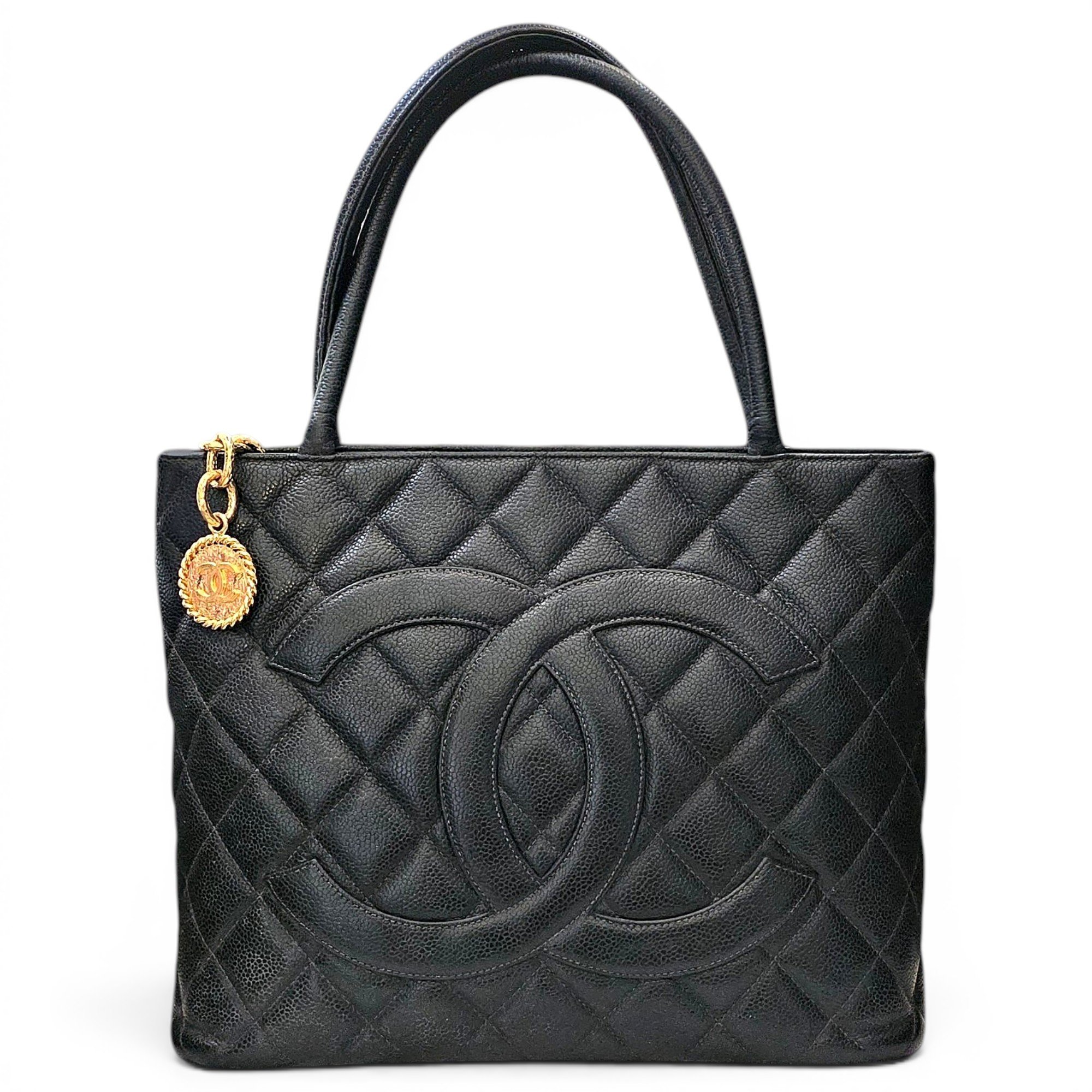 Médaillon leather handbag