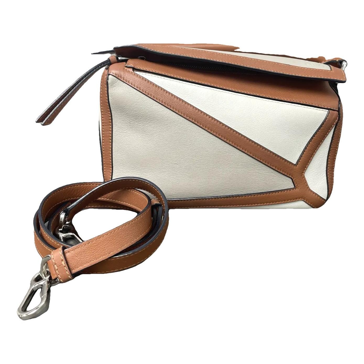 Puzzle leather handbag