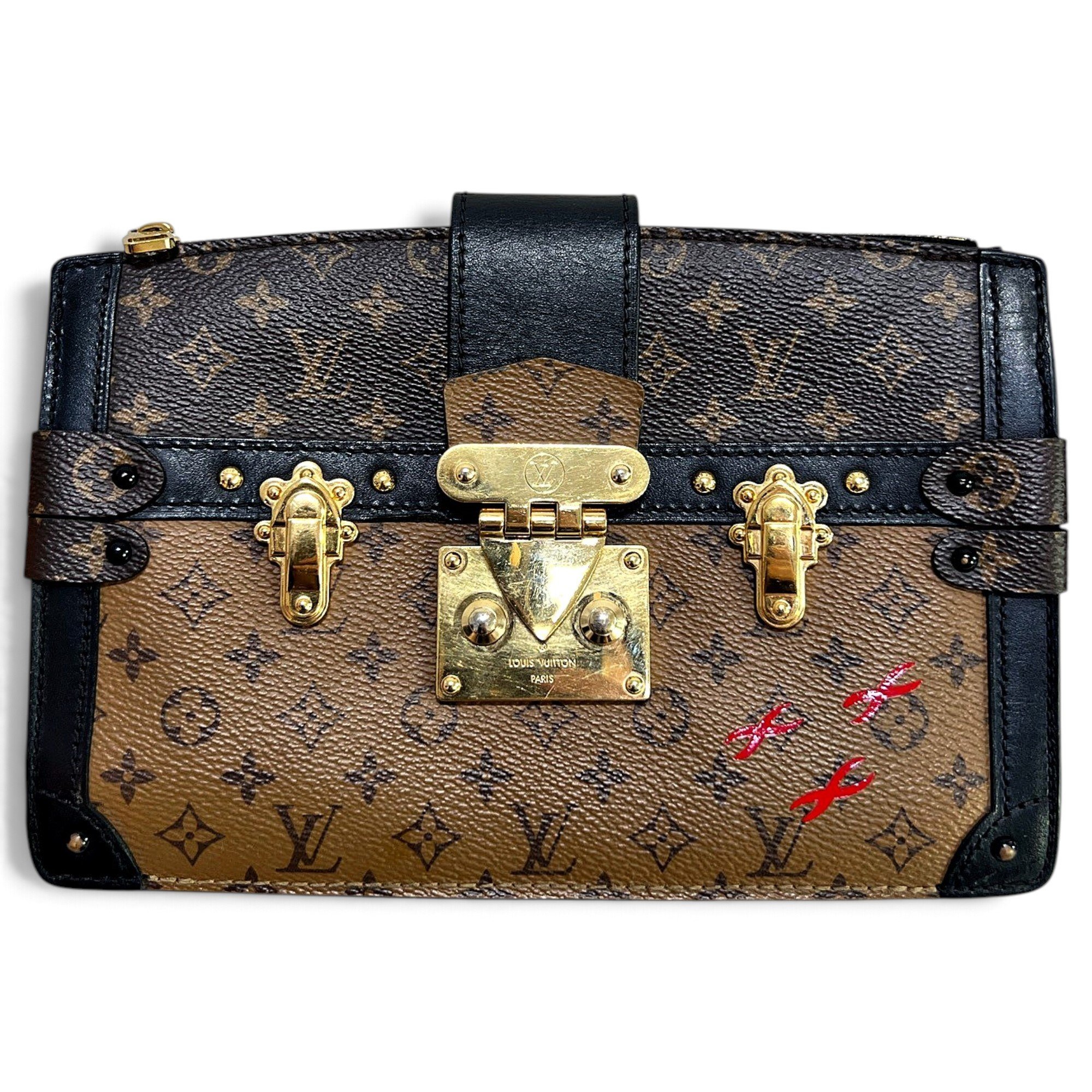 Pochette Trunk leather handbag