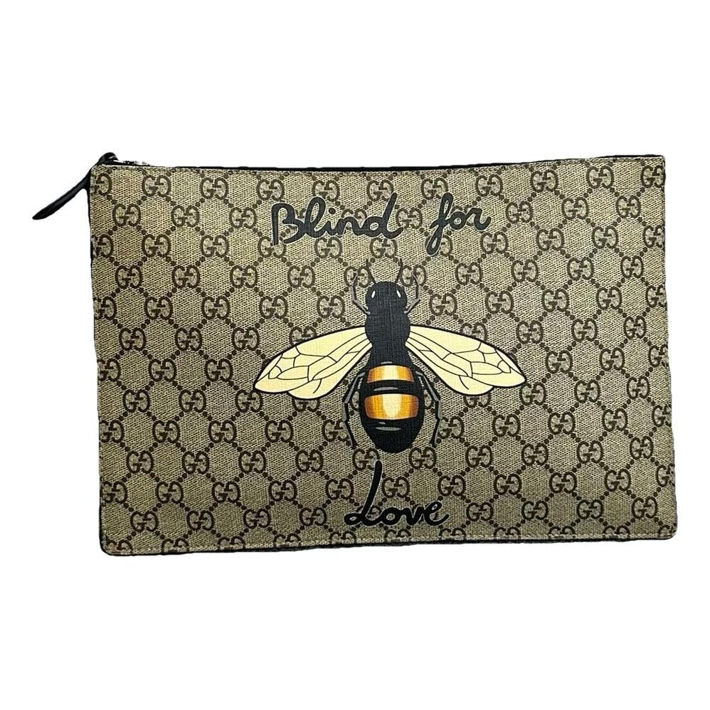 Ophidia cloth clutch bag