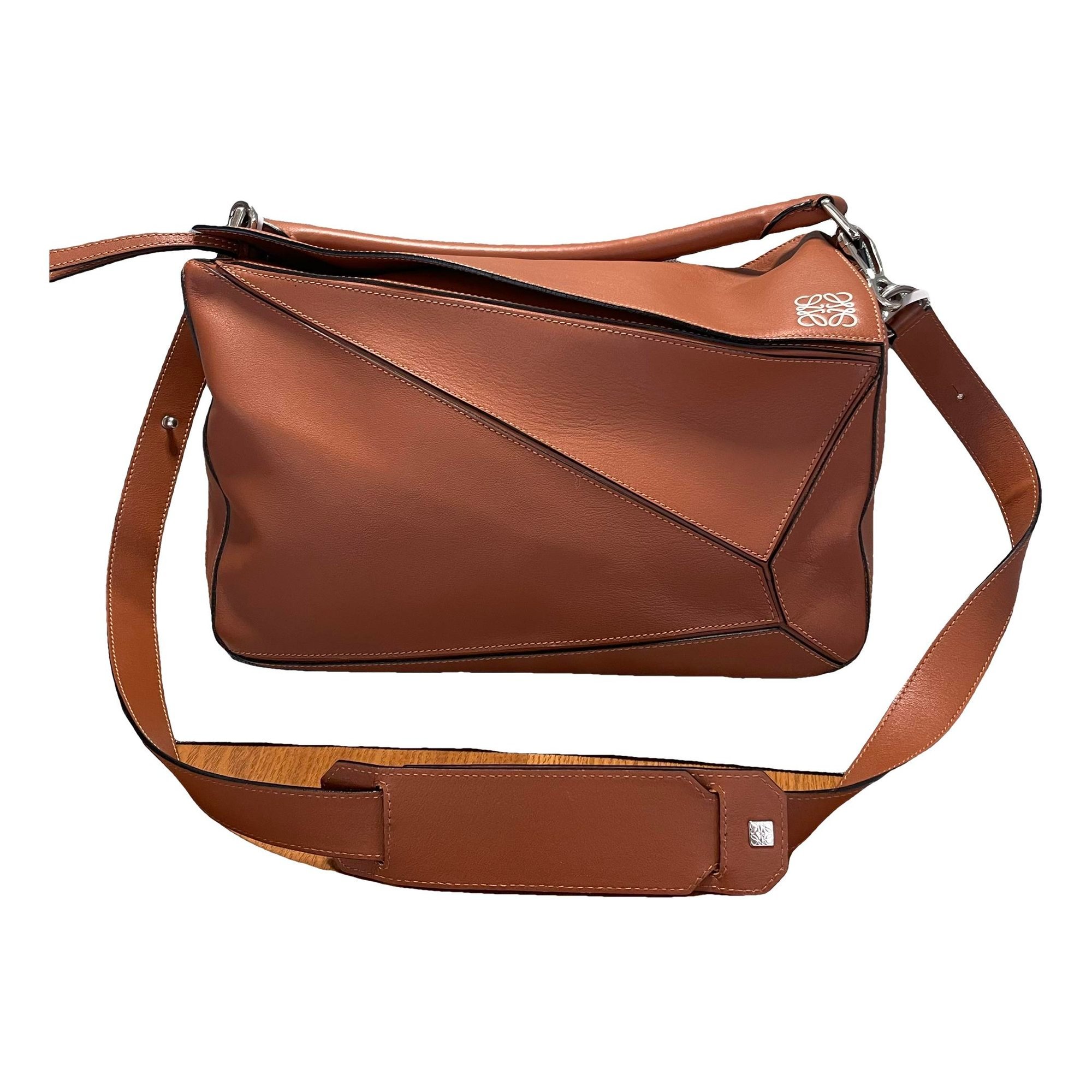 Puzzle leather handbag