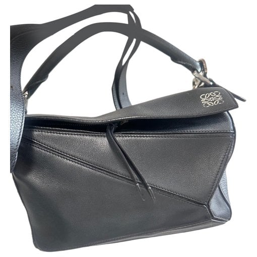 Puzzle leather handbag