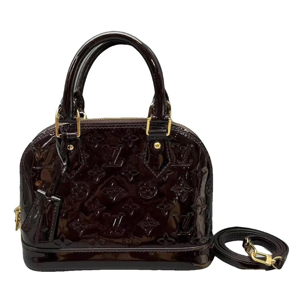 Alma BB patent leather handbag