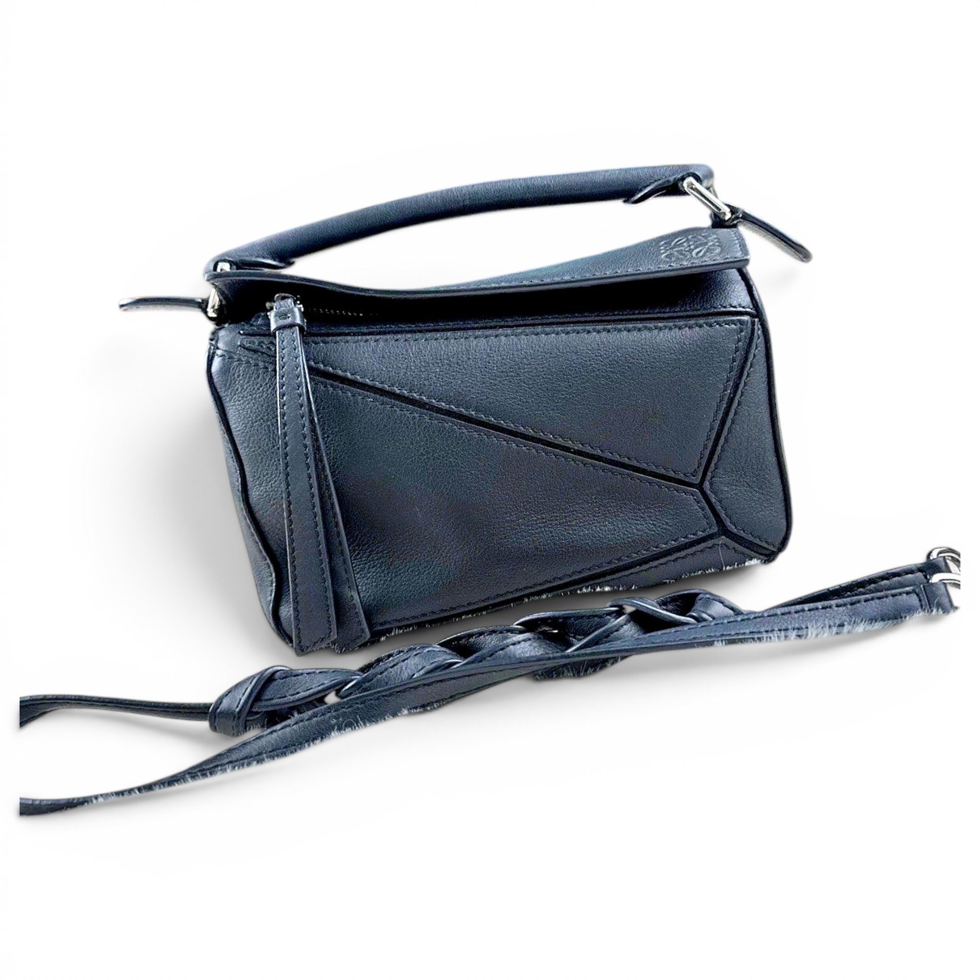 Puzzle leather handbag