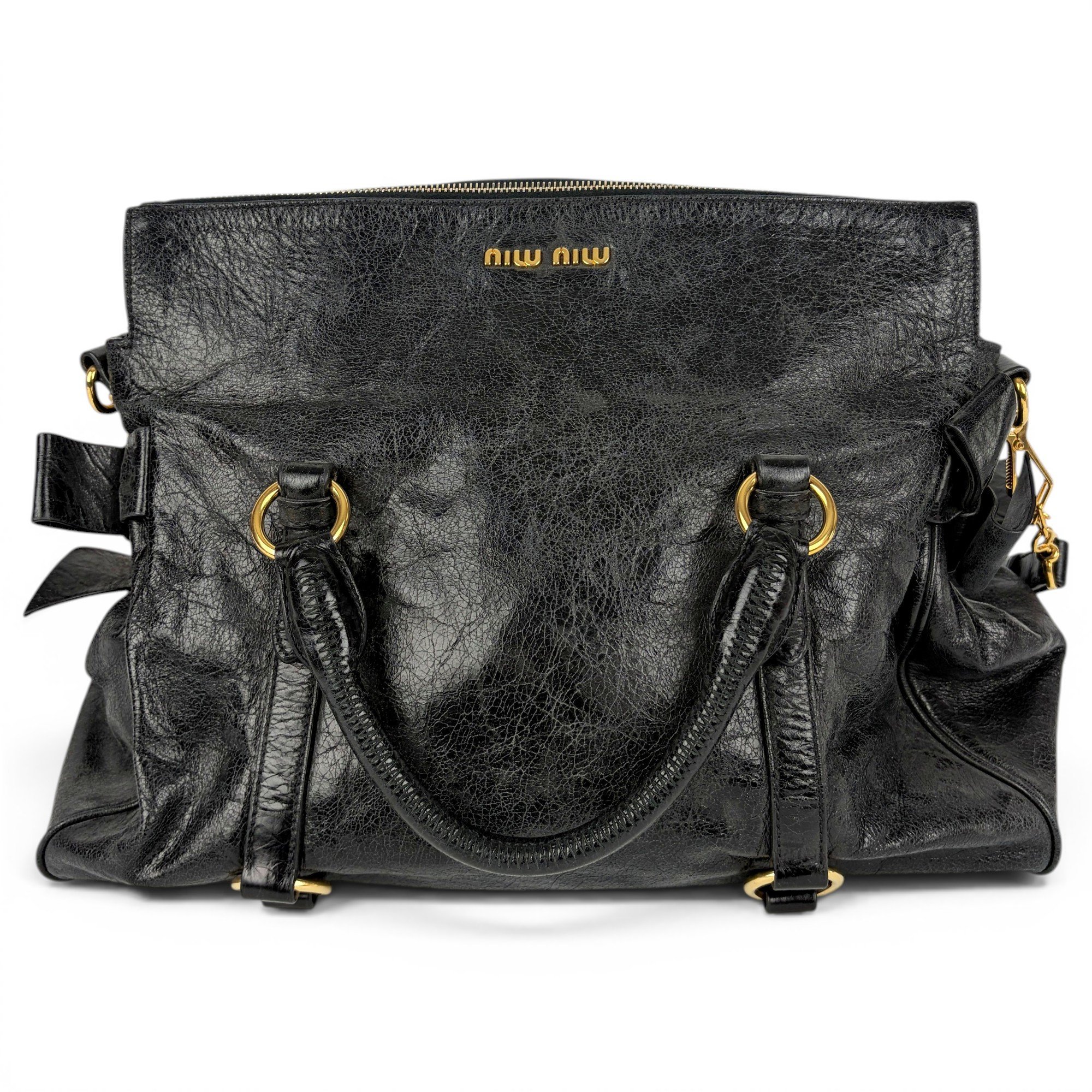 Bow bag leather handbag