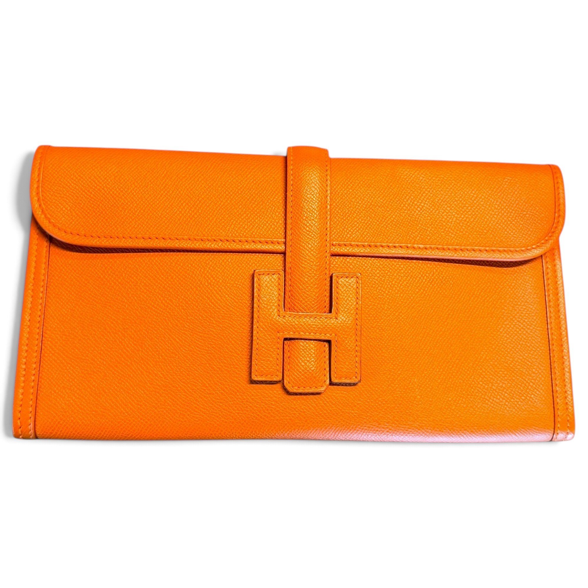 Jige leather clutch bag