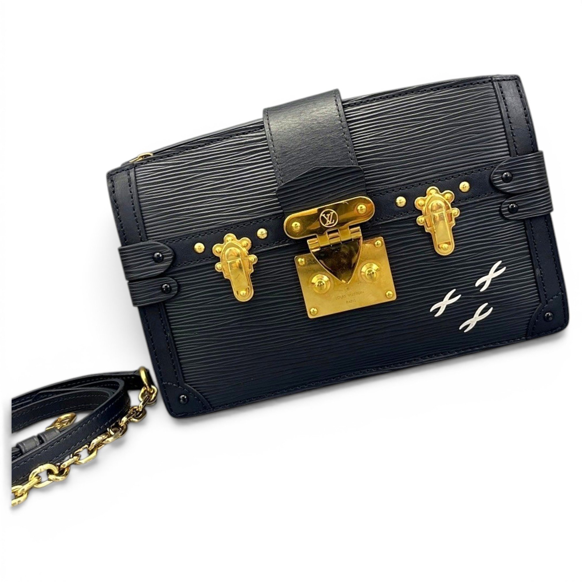 Pochette Trunk leather handbag