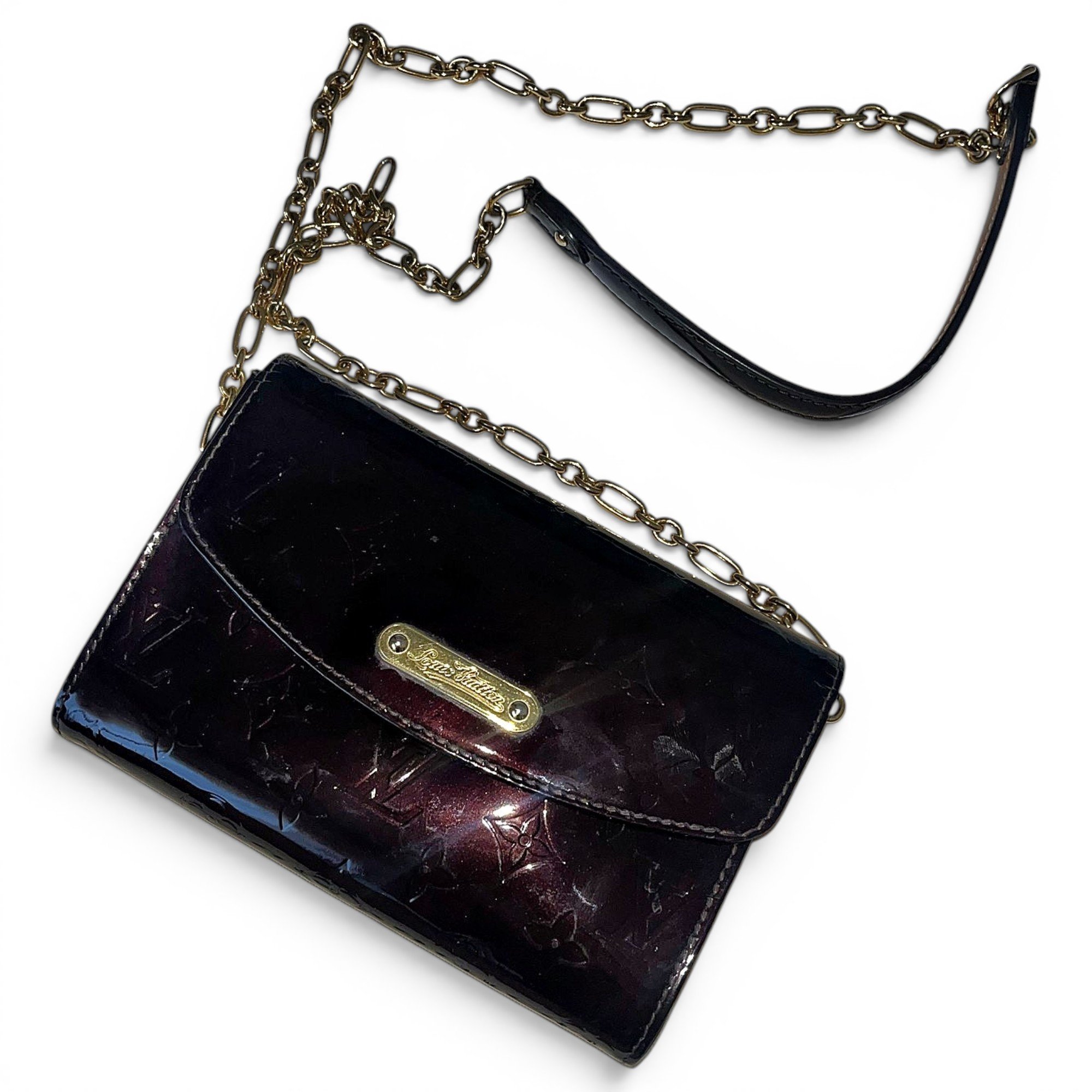 Patent leather clutch bag