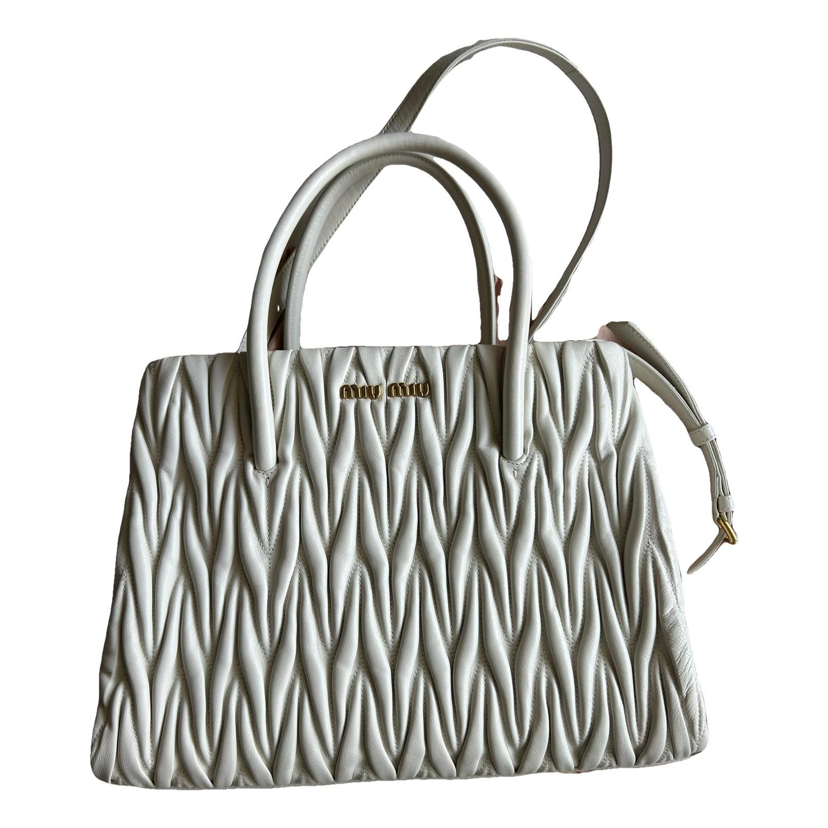 Matelassé leather clutch bag