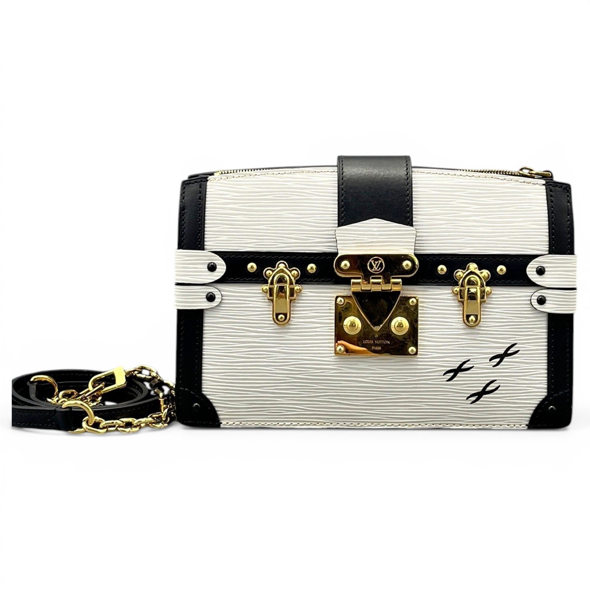 Pochette Trunk leather handbag