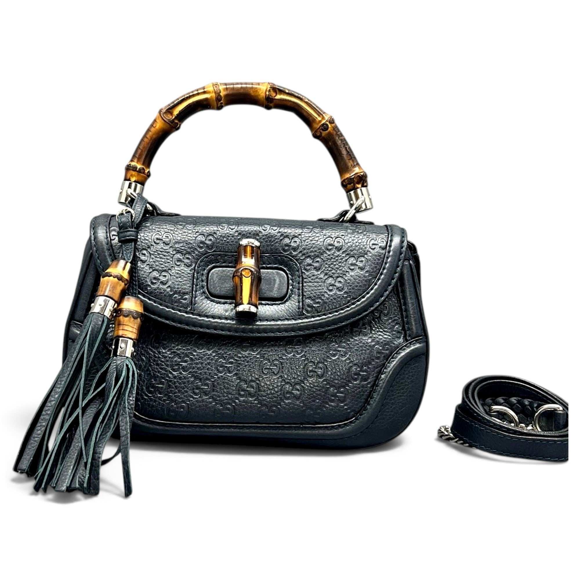 Convertible Pompon Bamboo Top Handle leather handbag
