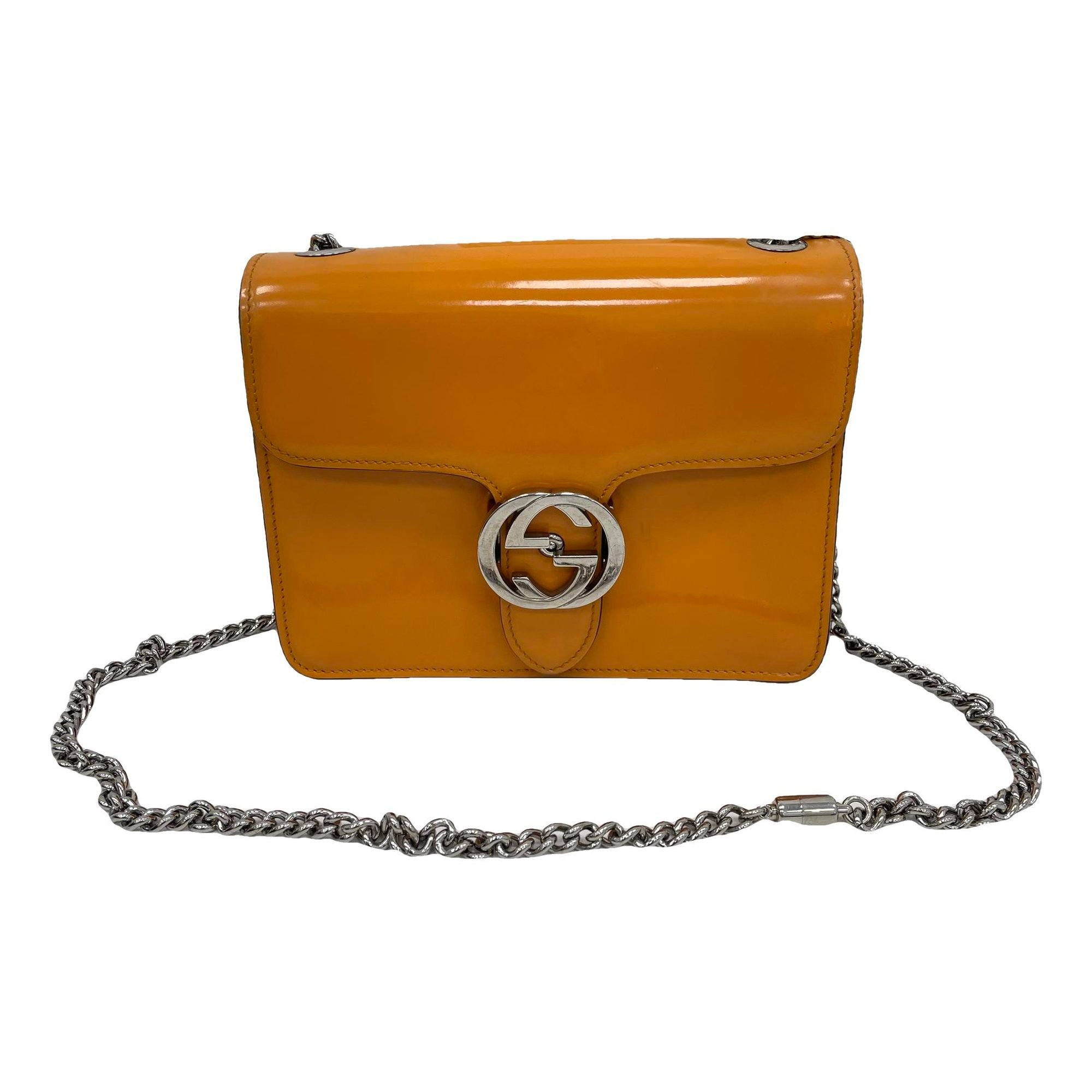 Interlocking patent leather handbag