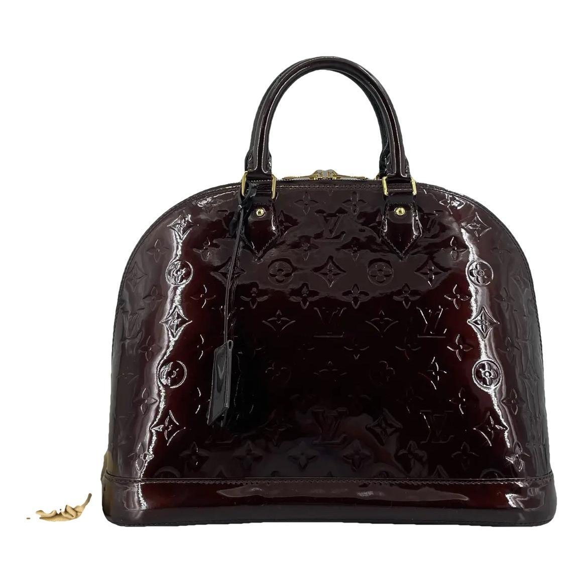 Alma patent leather handbag