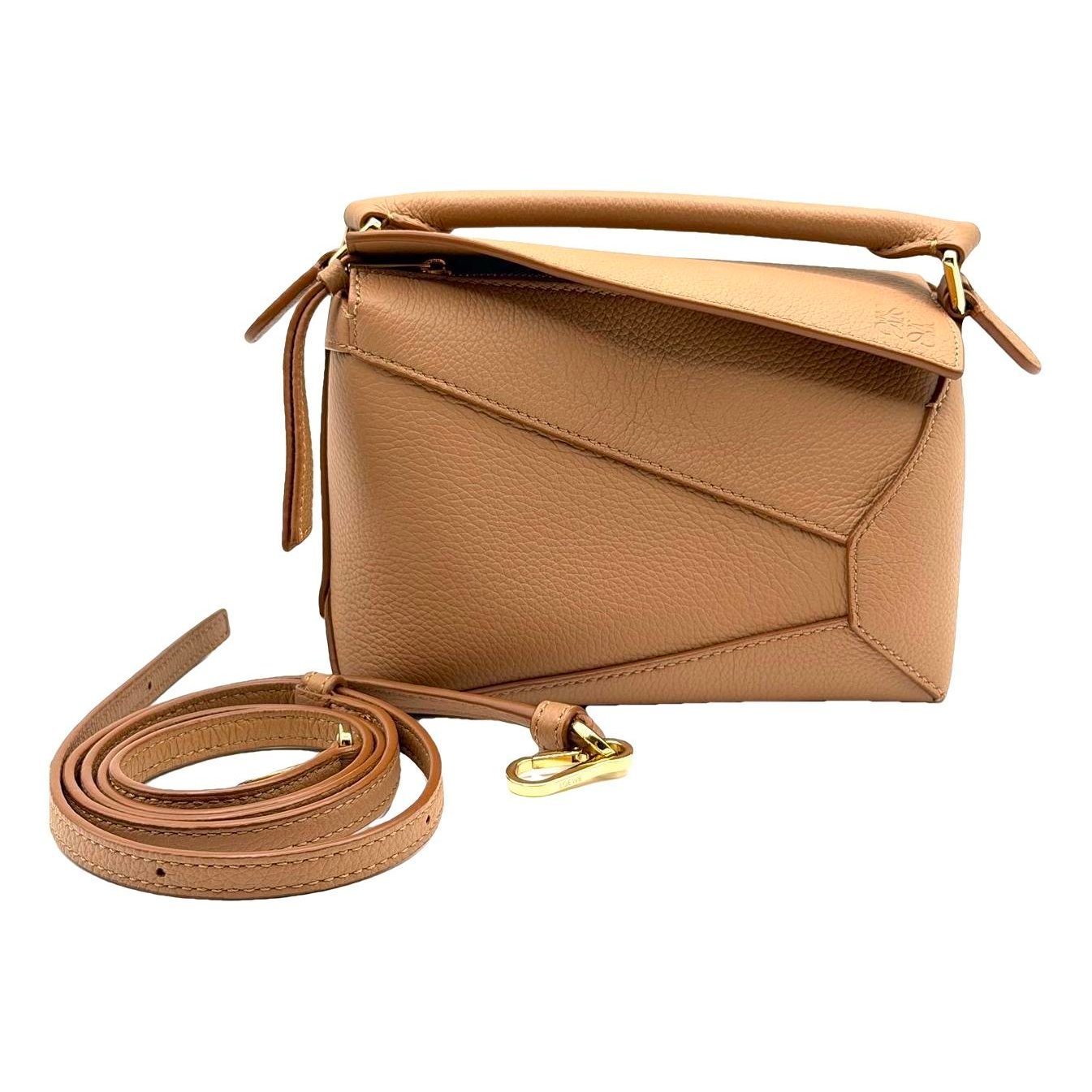 Puzzle leather handbag