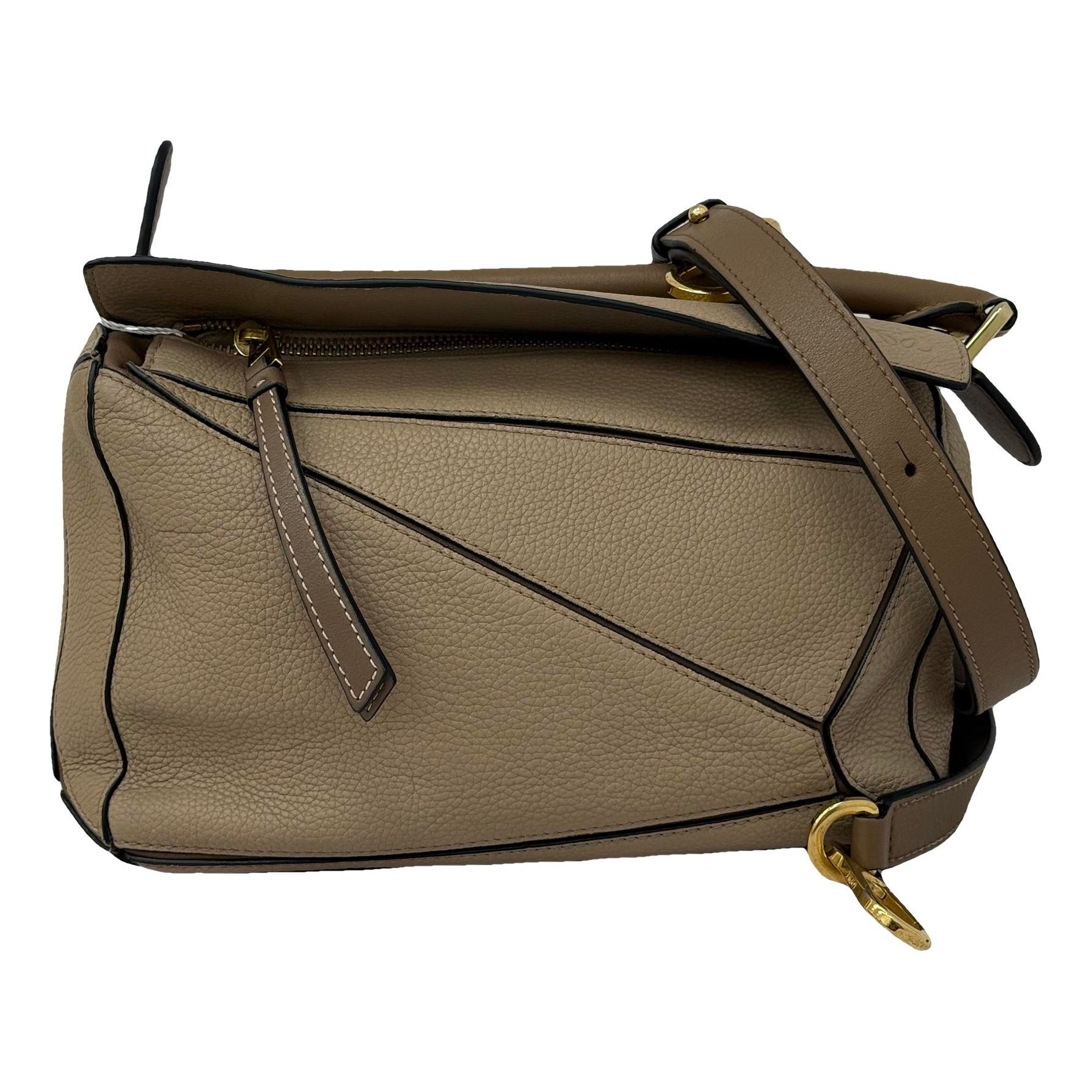 Puzzle leather handbag