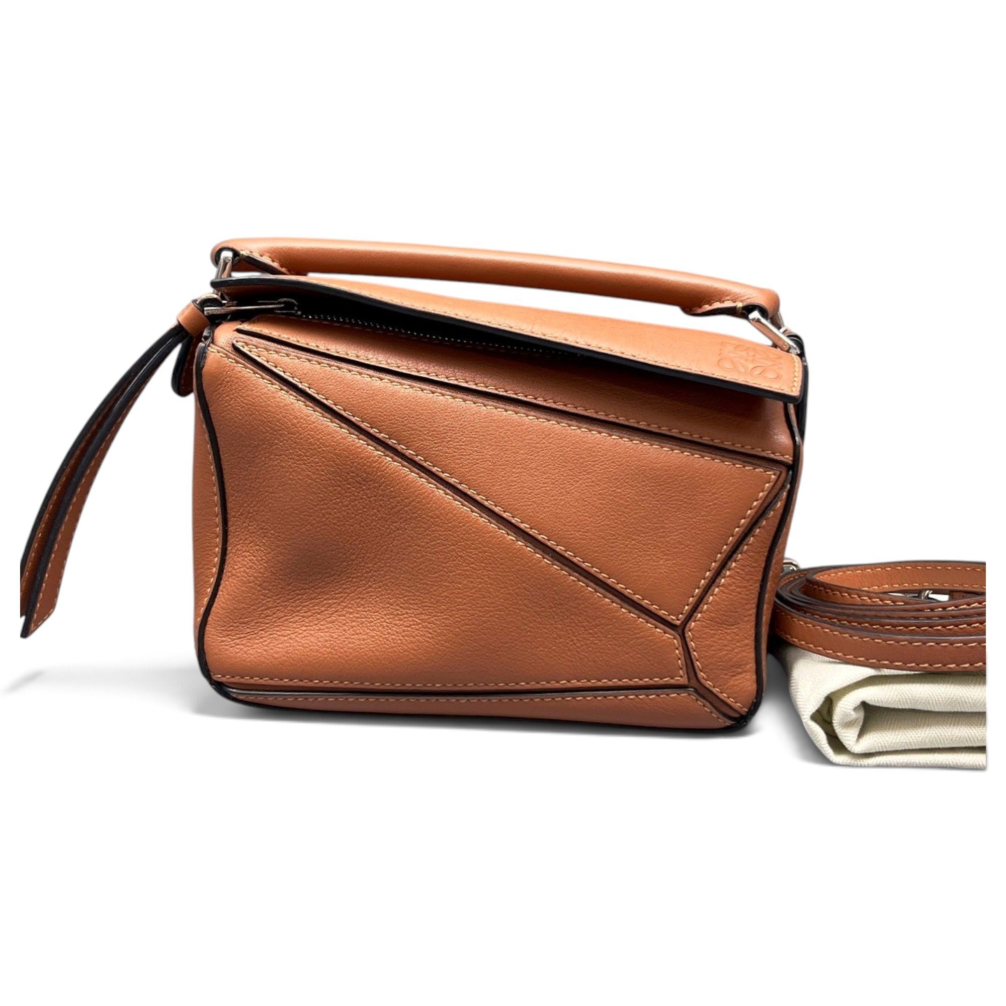 Puzzle leather handbag