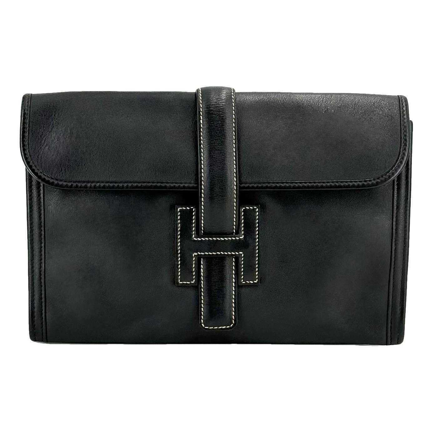 Jige leather clutch bag
