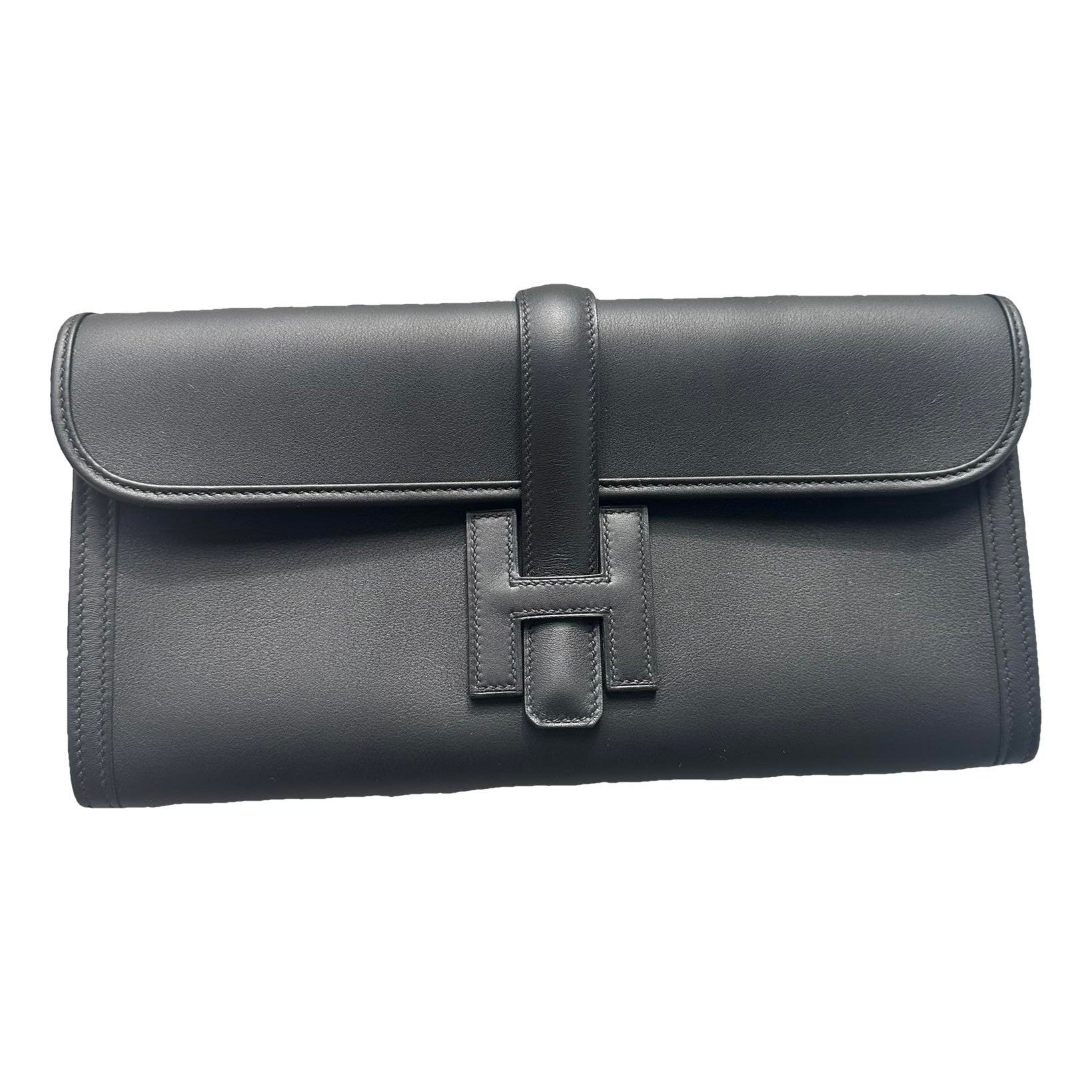 Jige leather clutch bag