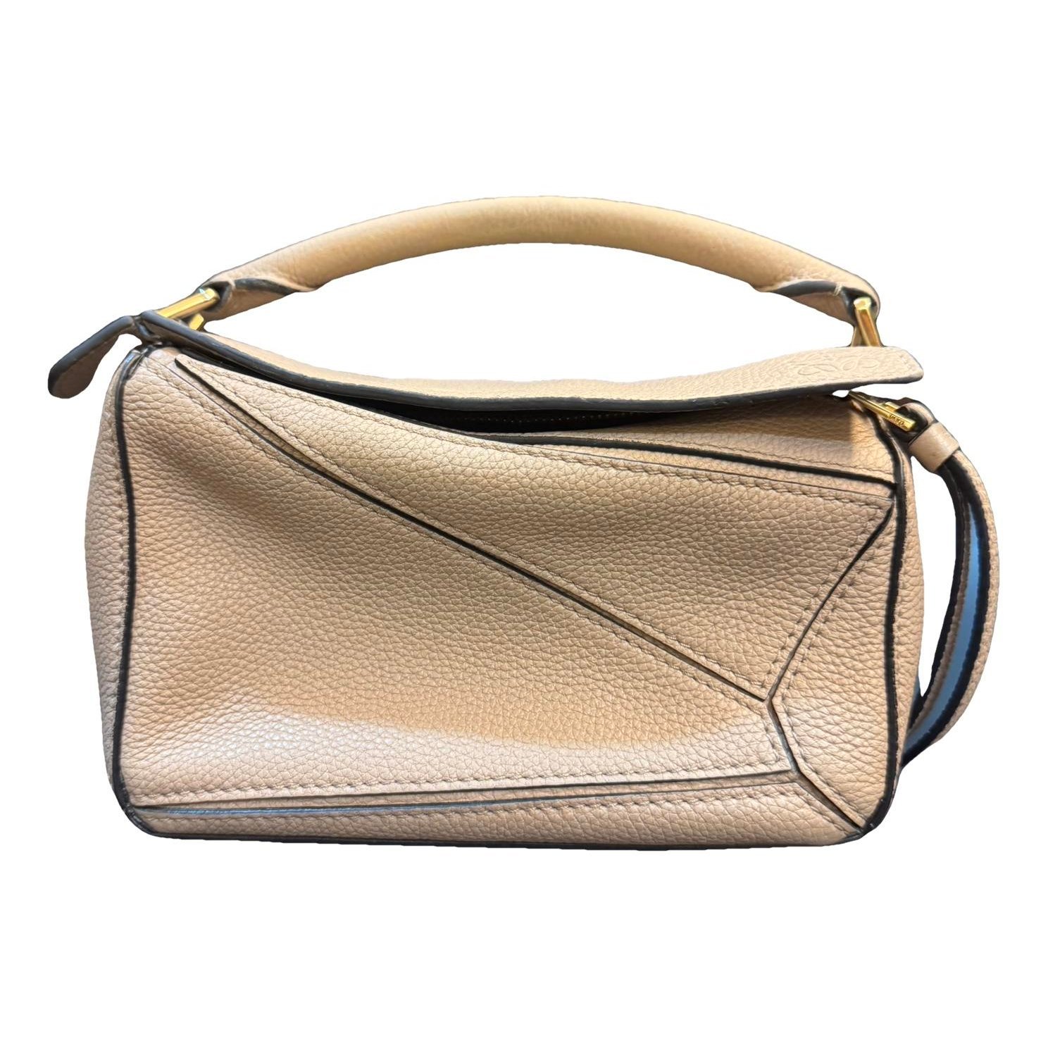 Puzzle leather handbag