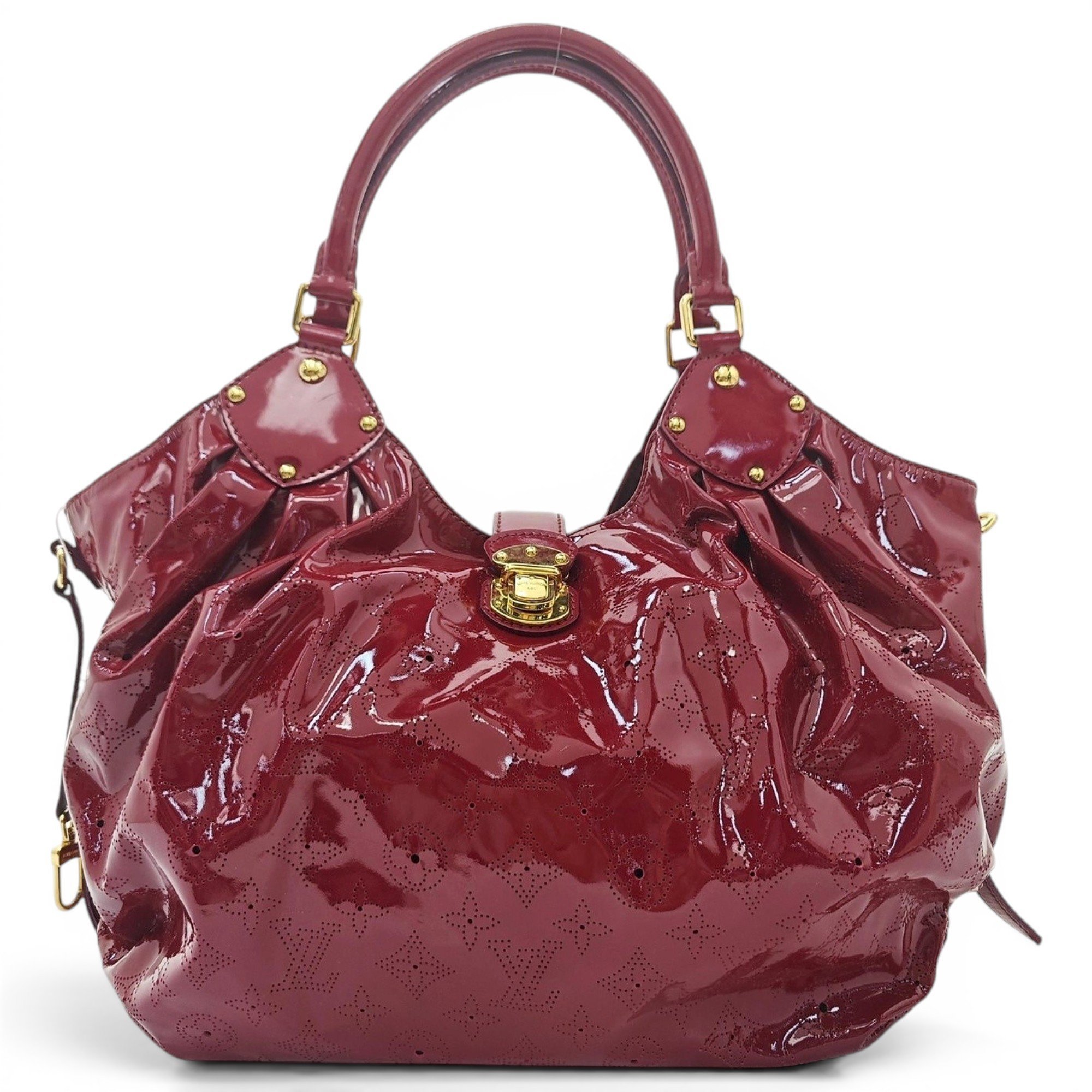 Surya patent leather handbag